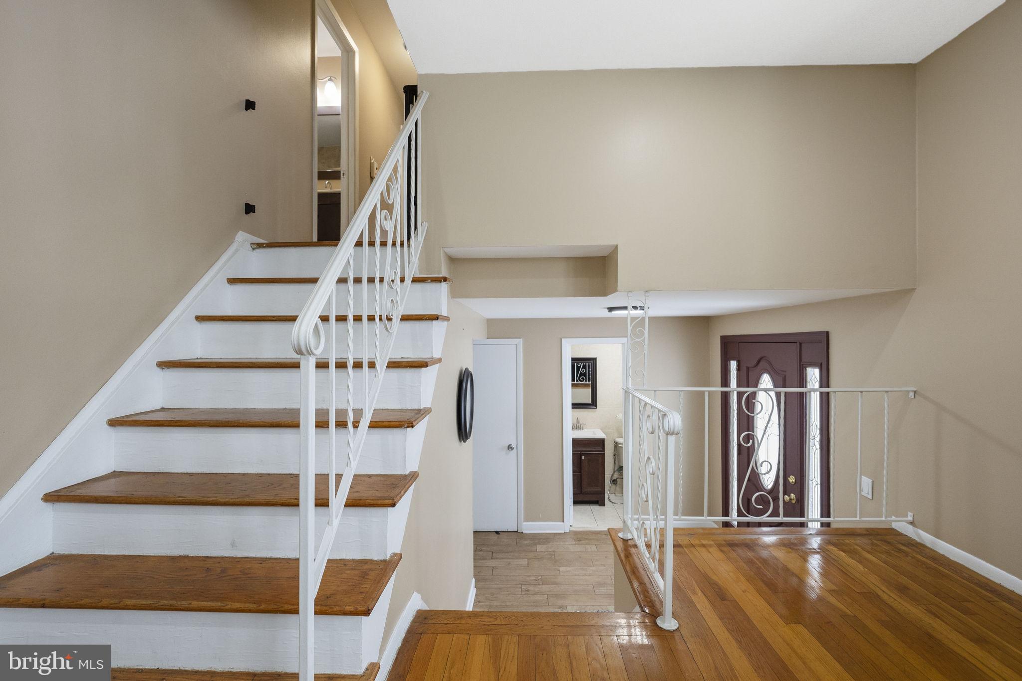 10 Magee Road Edison, NJ 08817 - Photo 23 of 45 a view of entryway with hall and wooden floor