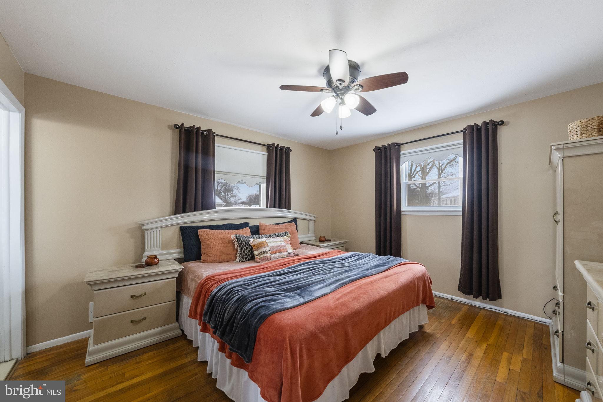 10 Magee Road Edison, NJ 08817 - Photo 24 of 45 a bedroom with a bed and wooden floor