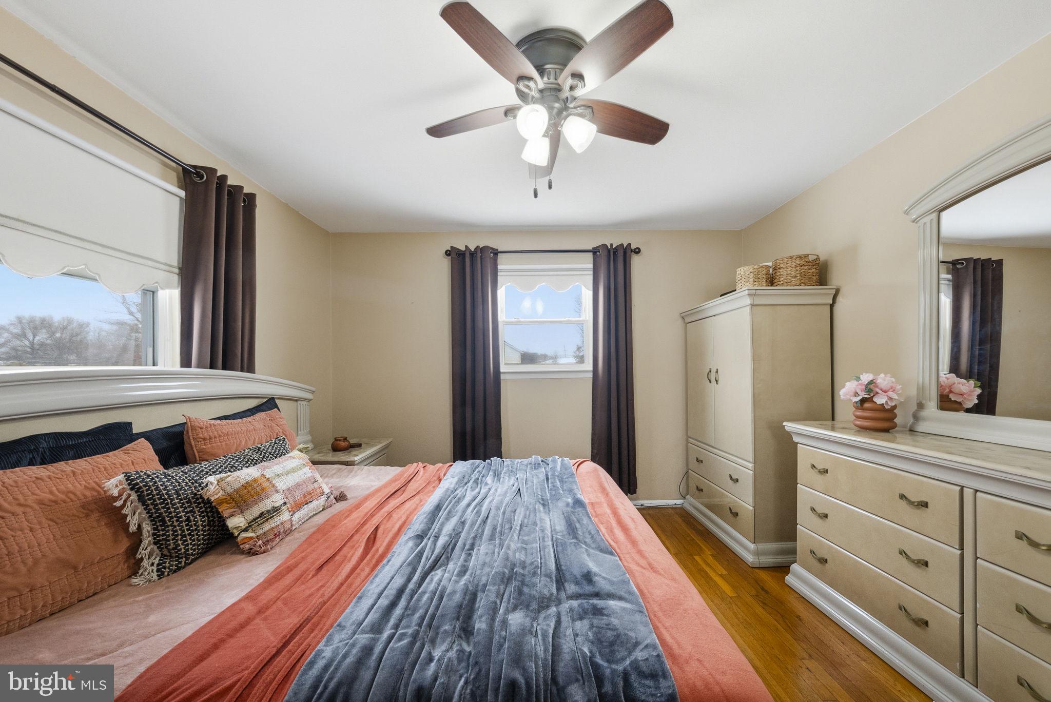 10 Magee Road Edison, NJ 08817 - Photo 25 of 45 a bedroom with a large bed and a window