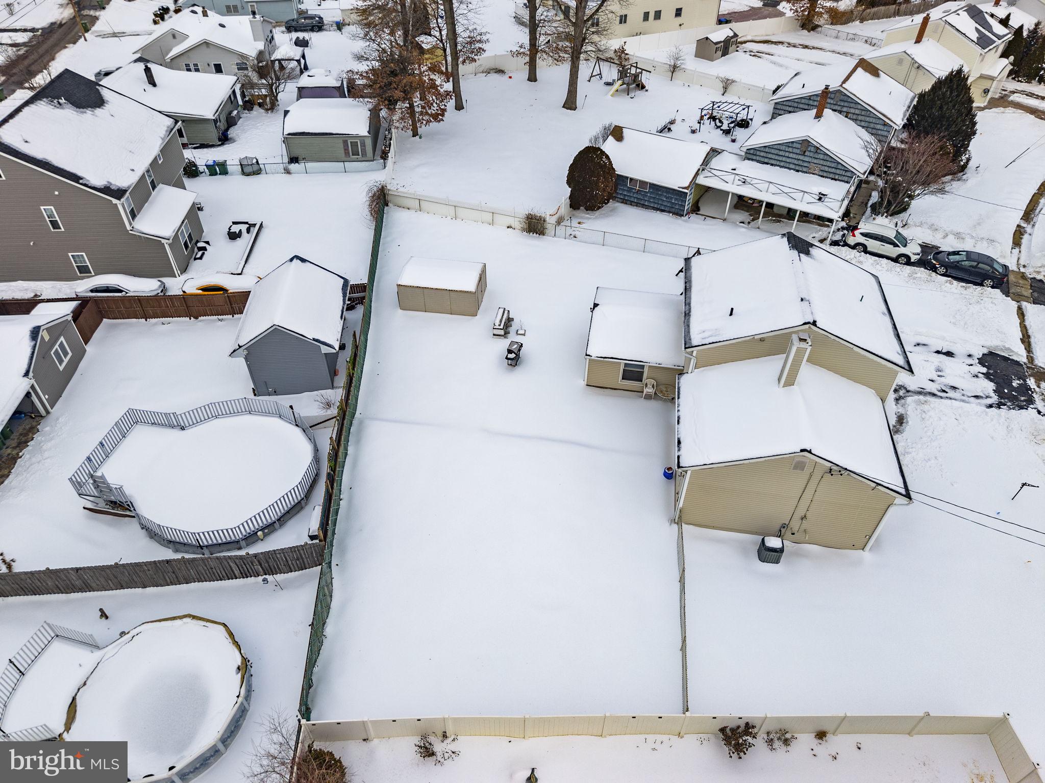 10 Magee Road Edison, NJ 08817 - Photo 39 of 45 an aerial view of a fireplace with wooden floor