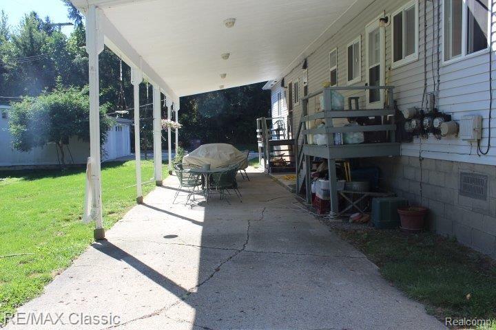 11161 Hall Road Whitmore Lake, MI 48189 - Photo 23 of 24 COVERED BACK PORCH