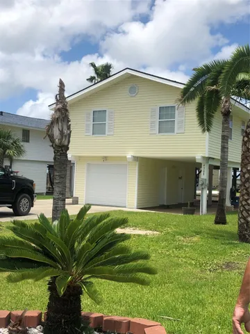 a house view with a garden space