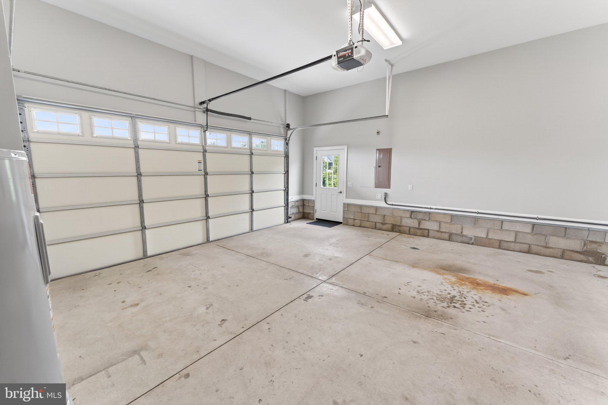 34029 Peppers Corner Road Millville, DE 19967 - Photo 20 of 101 Spacious garage with natural light.