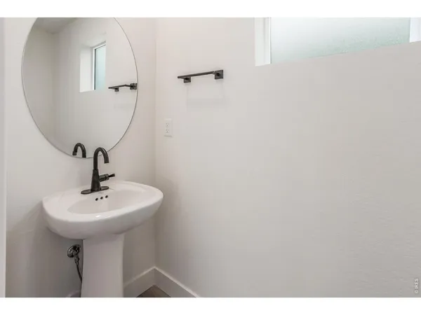 a bathroom with a shower and a toilet
