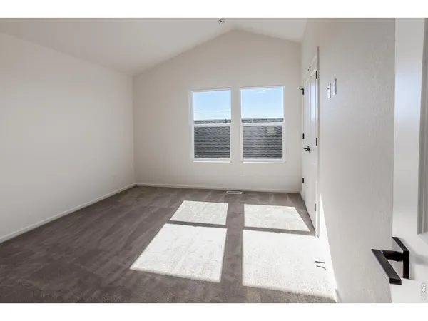 a bathroom with a toilet and a tub