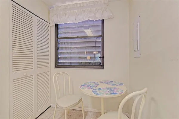 a kitchen with cabinets stainless steel appliances and a sink