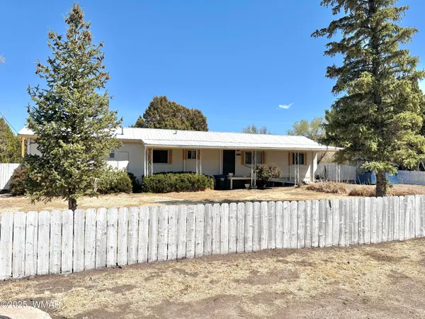 a front view of a house with a porch