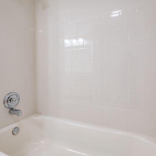 250 Northeast 20th Street, Unit 3210 Boca Raton, FL 33431 - Photo 17 of 26 a bathroom with a bathtub