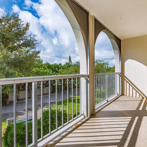 250 Northeast 20th Street, Unit 3210 Boca Raton, FL 33431 - Photo 26 of 26 a view of a brick house with a large window