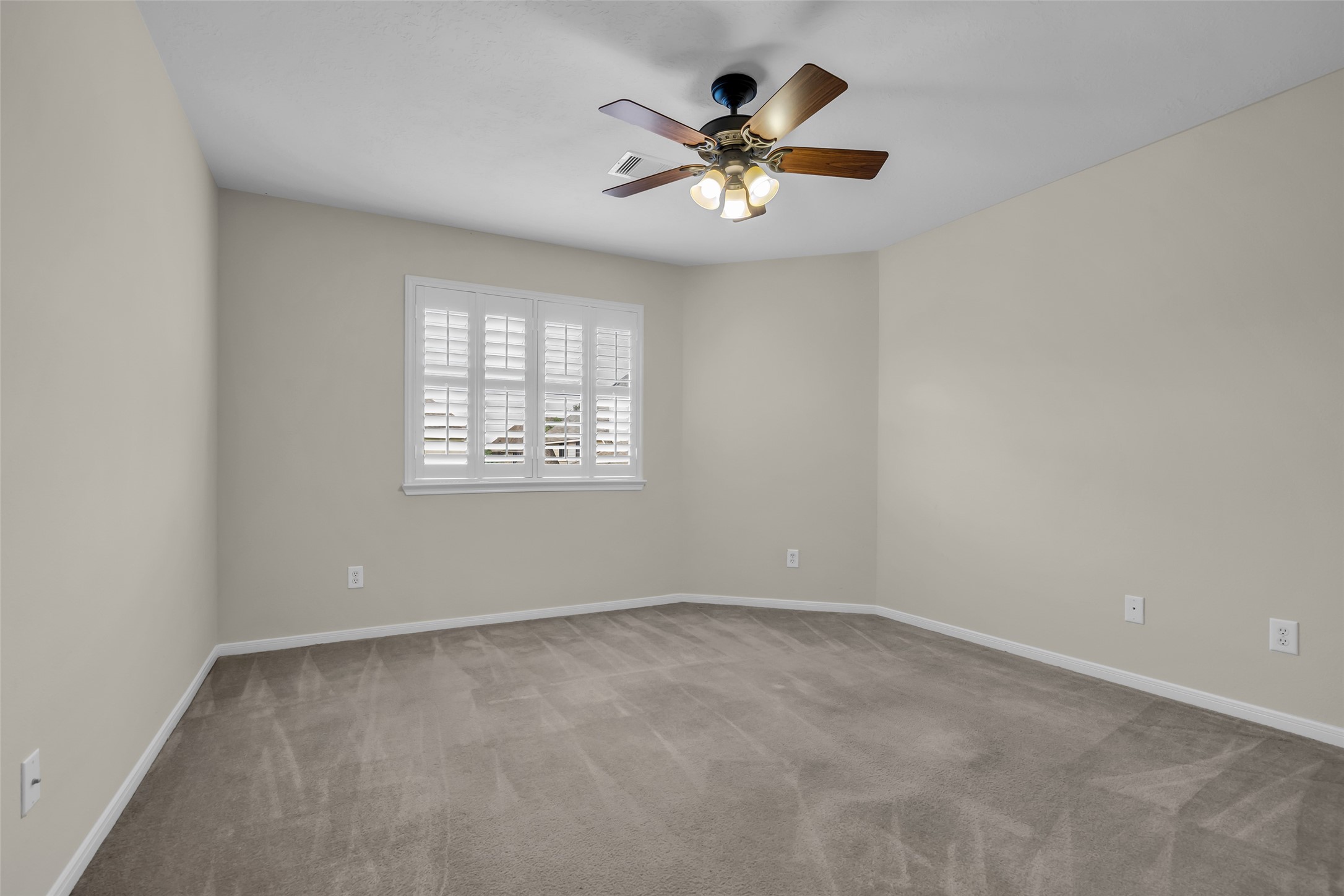 6807 Chapelfield Lane Houston, TX 77049 - Photo 35 of 42 an empty room with a window
