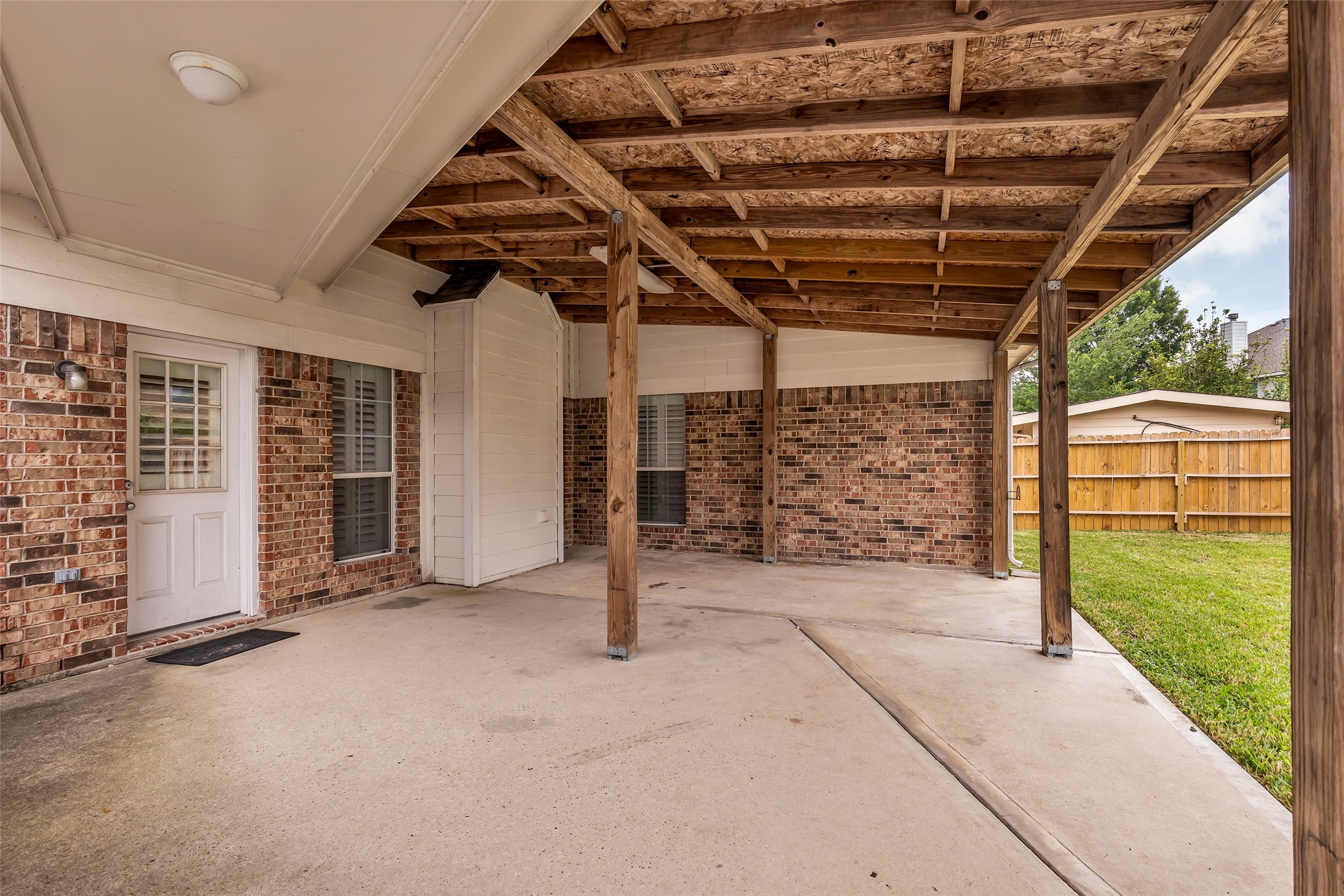 6807 Chapelfield Lane Houston, TX 77049 - Photo 39 of 42 a view of a room with wooden walls