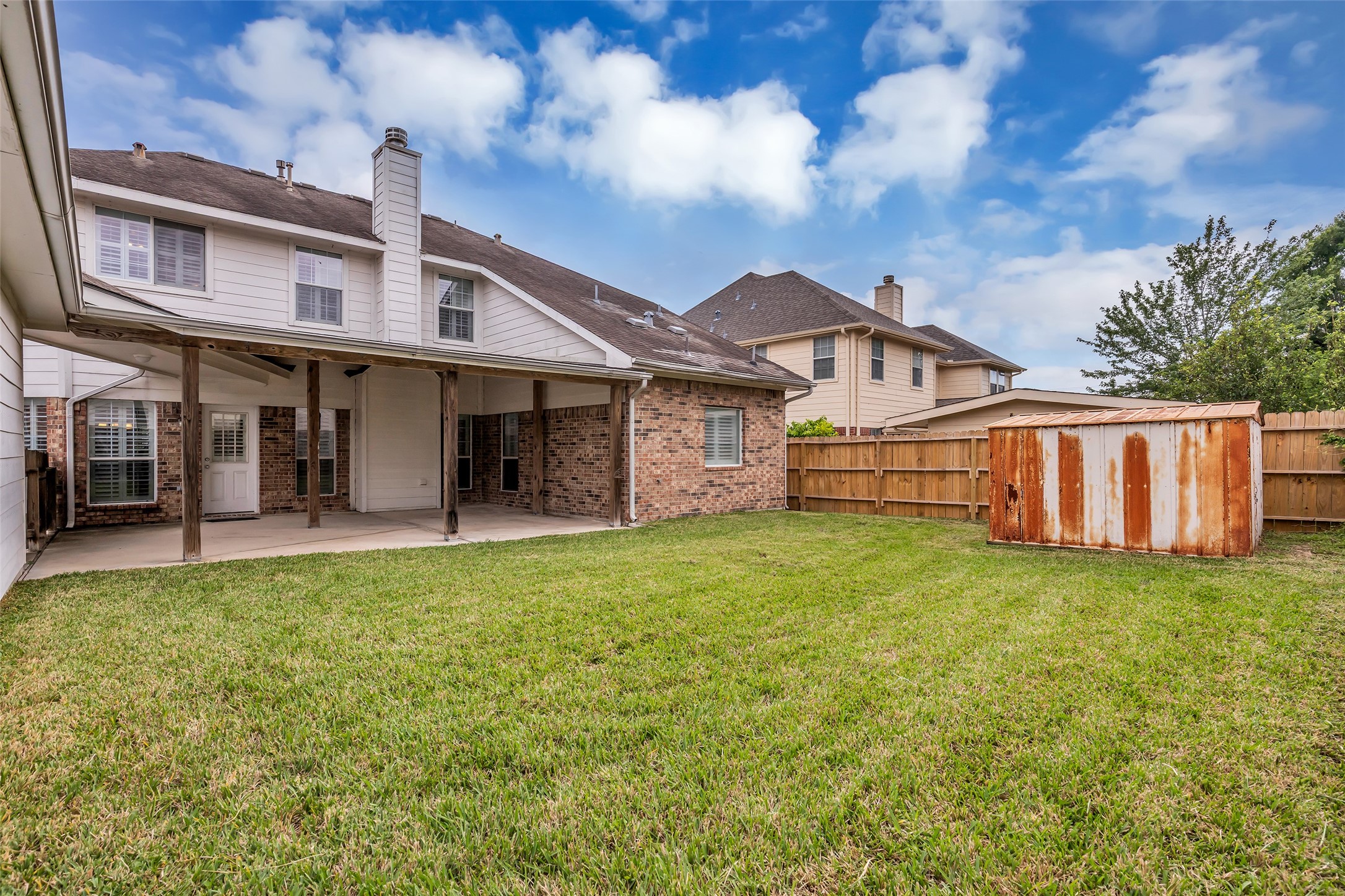 6807 Chapelfield Lane Houston, TX 77049 - Photo 42 of 42 a view of a house with backyard and porch