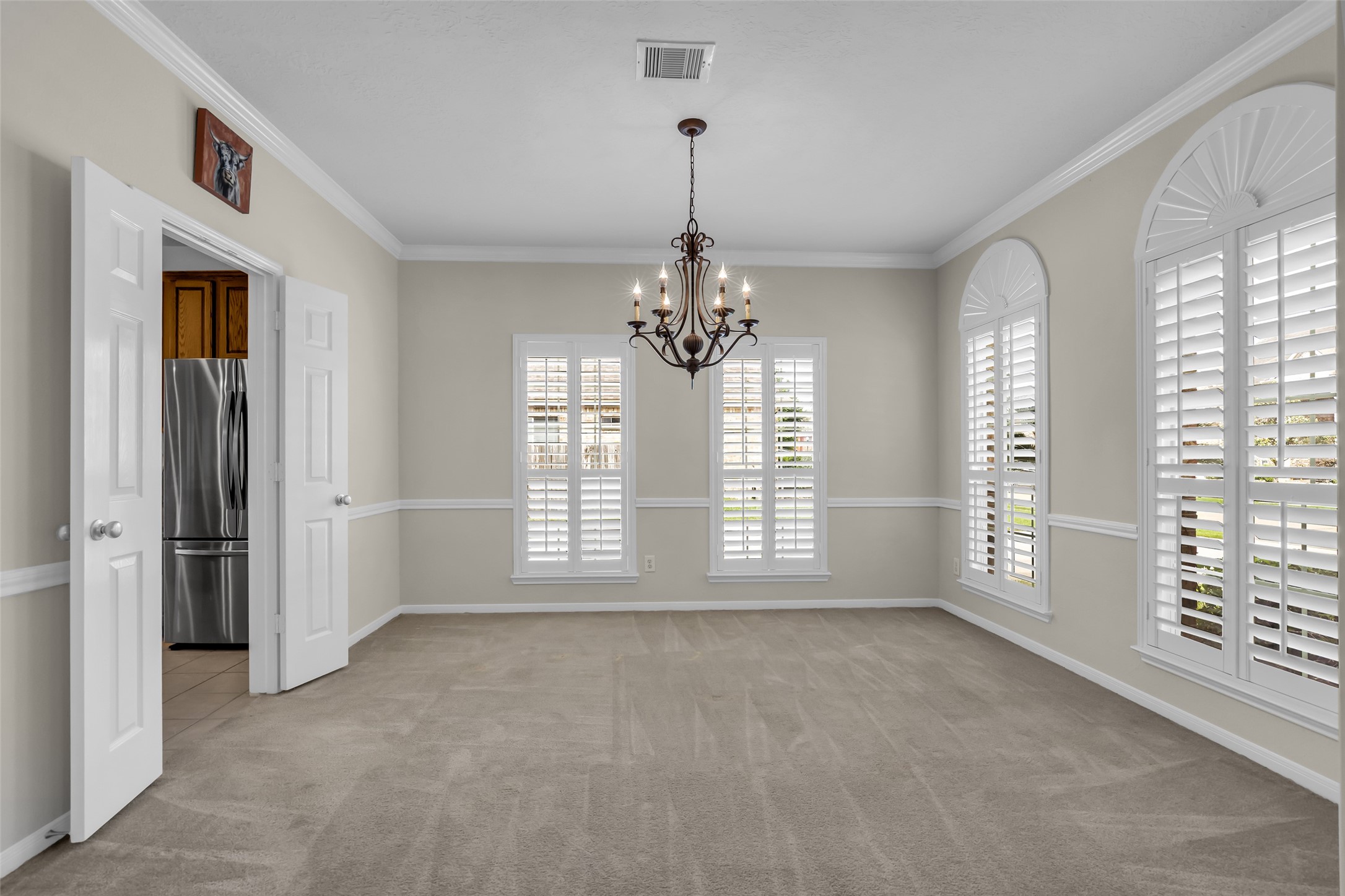 6807 Chapelfield Lane Houston, TX 77049 - Photo 10 of 42 a view of an empty room with a window and bathroom