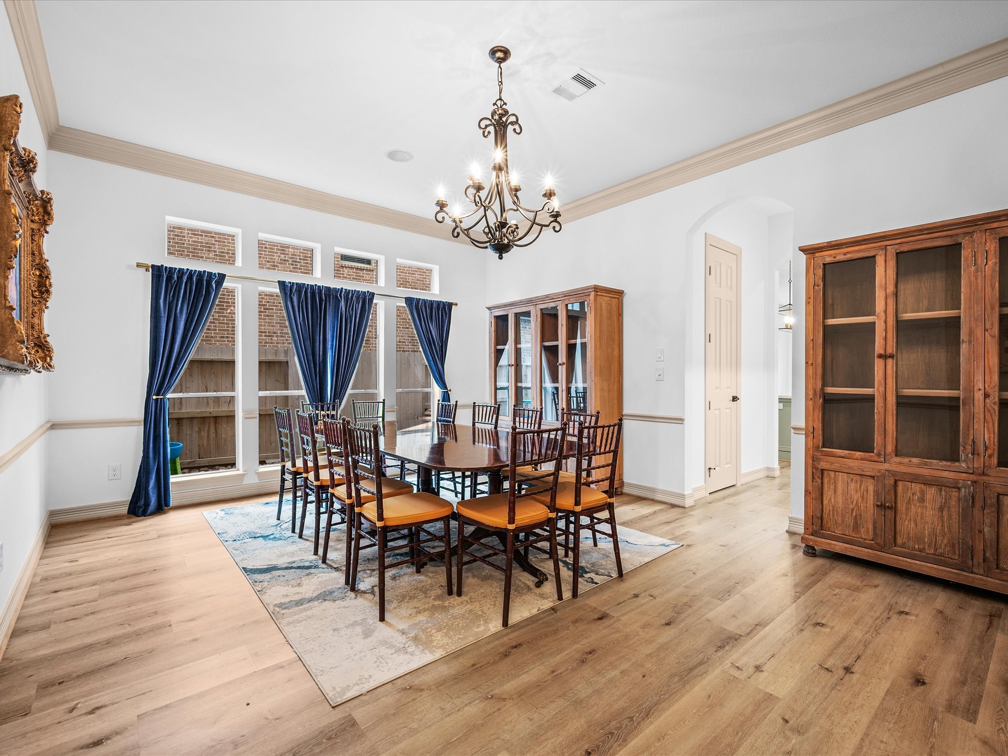 11410 Carson Field Lane Cypress, TX 77433 - Photo 16 of 47 Formal dining room with elegant lighting and generous seating space.