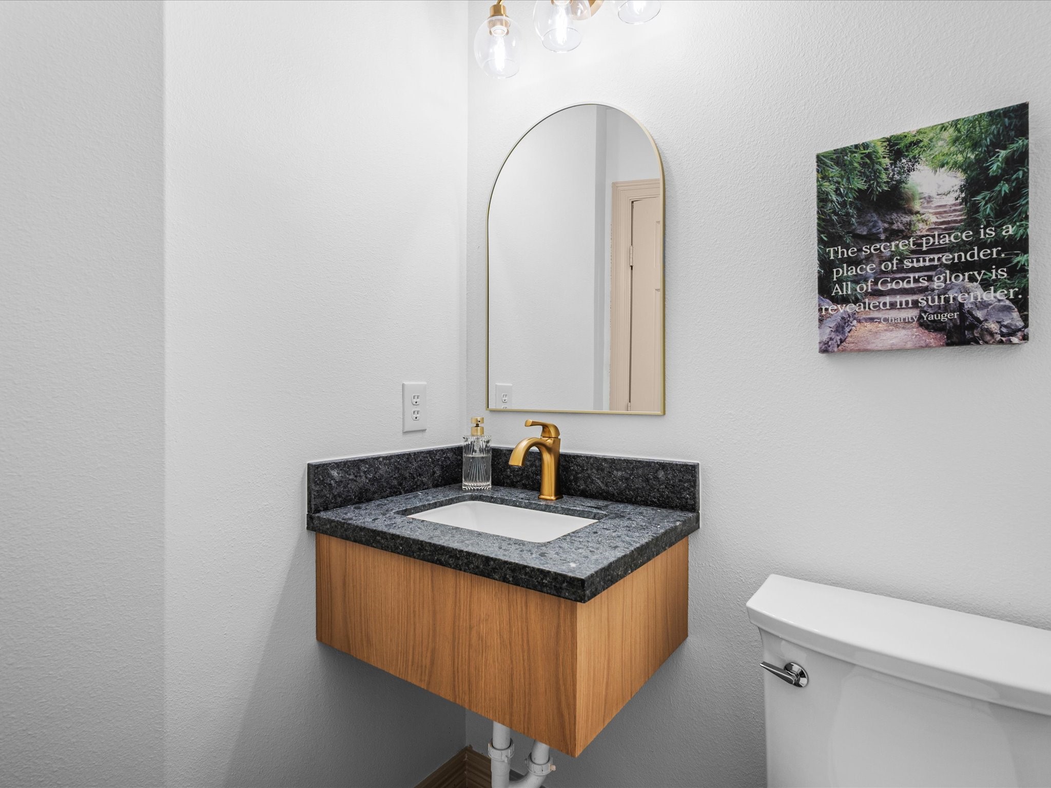 11410 Carson Field Lane Cypress, TX 77433 - Photo 19 of 47 Half bath with modern floating vanity sink.