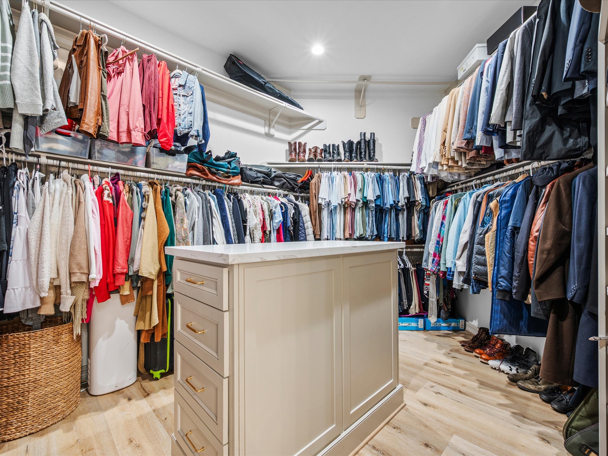 11410 Carson Field Lane Cypress, TX 77433 - Photo 26 of 47 Custom walk-in closet with built-ins and island.