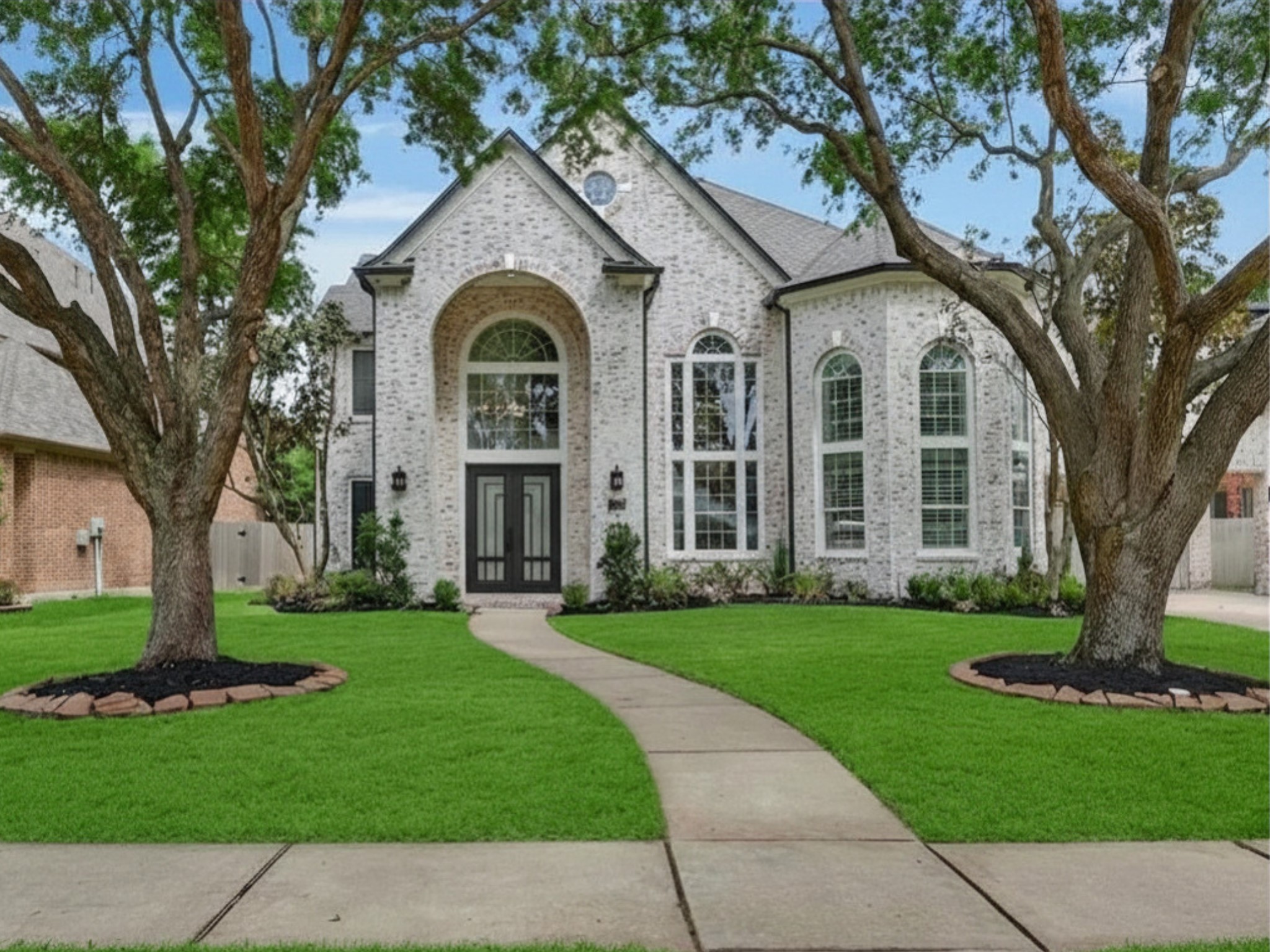 11410 Carson Field Lane Cypress, TX 77433 - Photo 39 of 47 Luxury lakefront home with German schmear brick exterior, mature trees, manicured landscaping, and exceptional curb appeal in Cypress.