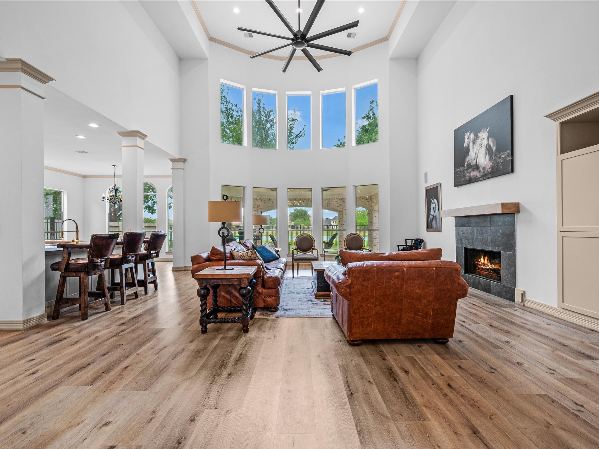 11410 Carson Field Lane Cypress, TX 77433 - Photo 6 of 47 Expansive family room with soaring ceilings, large windows, and open sightlines.