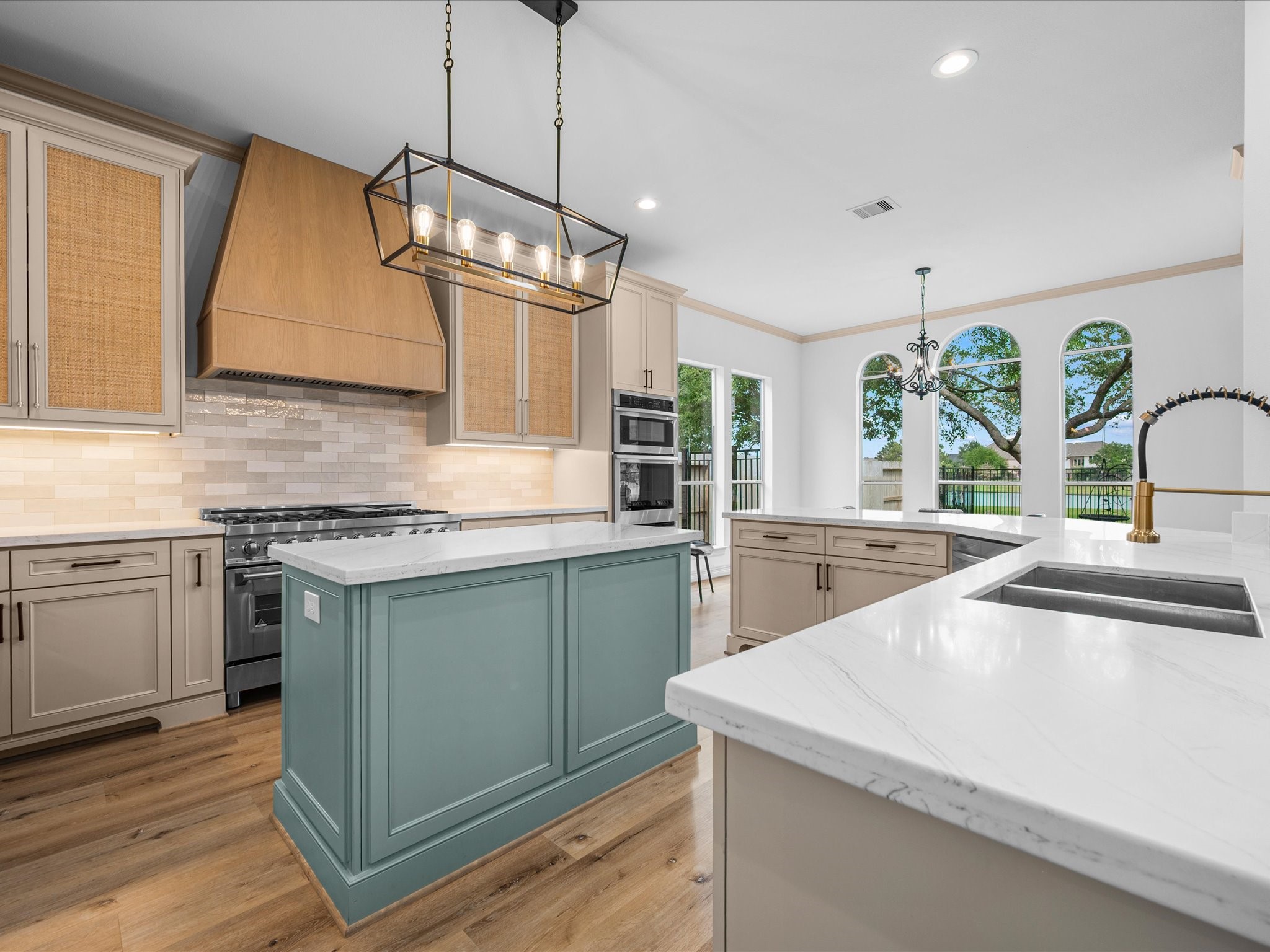 11410 Carson Field Lane Cypress, TX 77433 - Photo 10 of 47 Chef-inspired kitchen with decorative backsplash, ample storage, and premium finishes.