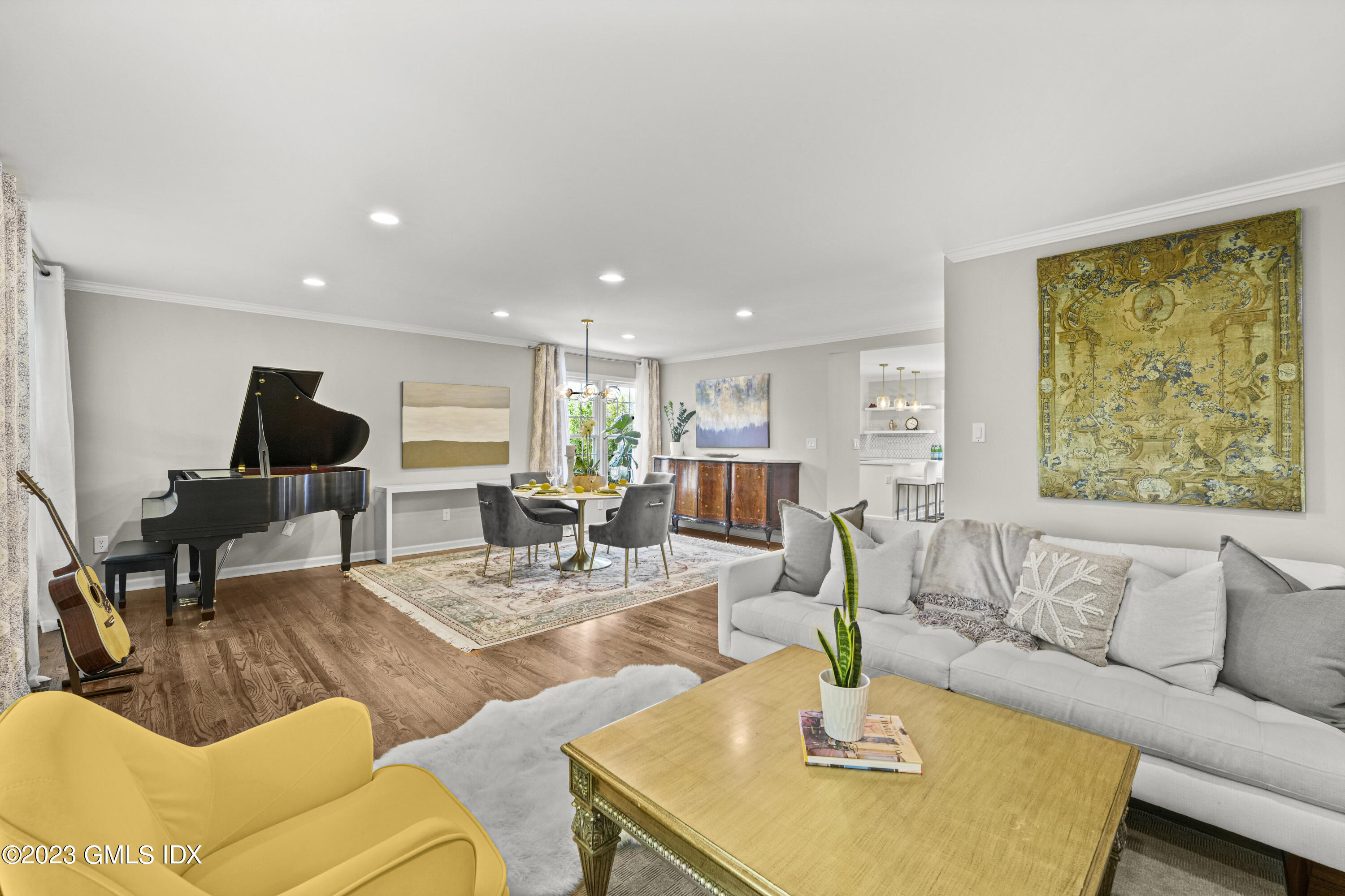 172 Field Point Road, Unit 6 Greenwich, CT 06830 - Photo 1 of 36 a living room with furniture kitchen view and a large window