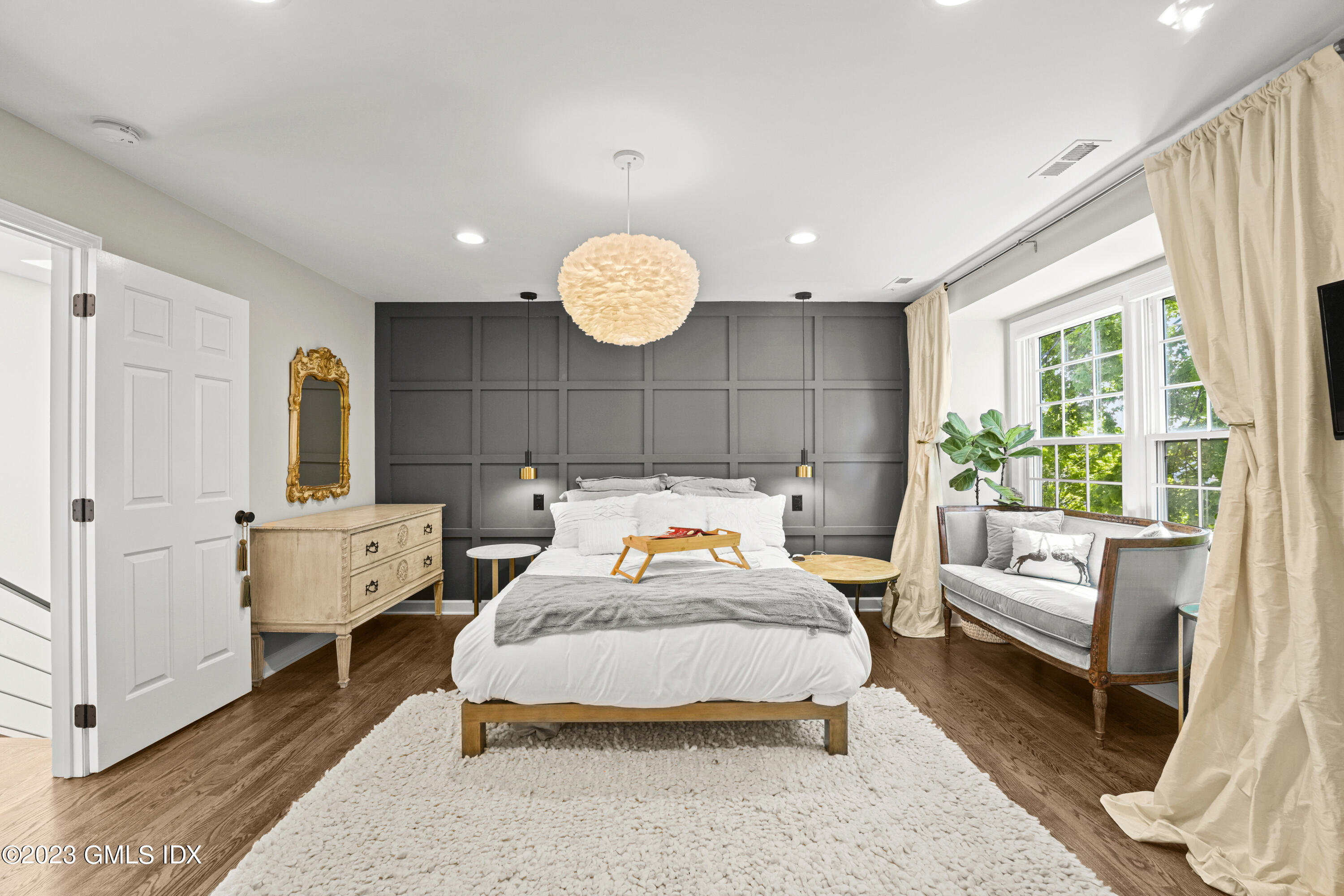 172 Field Point Road, Unit 6 Greenwich, CT 06830 - Photo 14 of 36 a bedroom with a bed and window