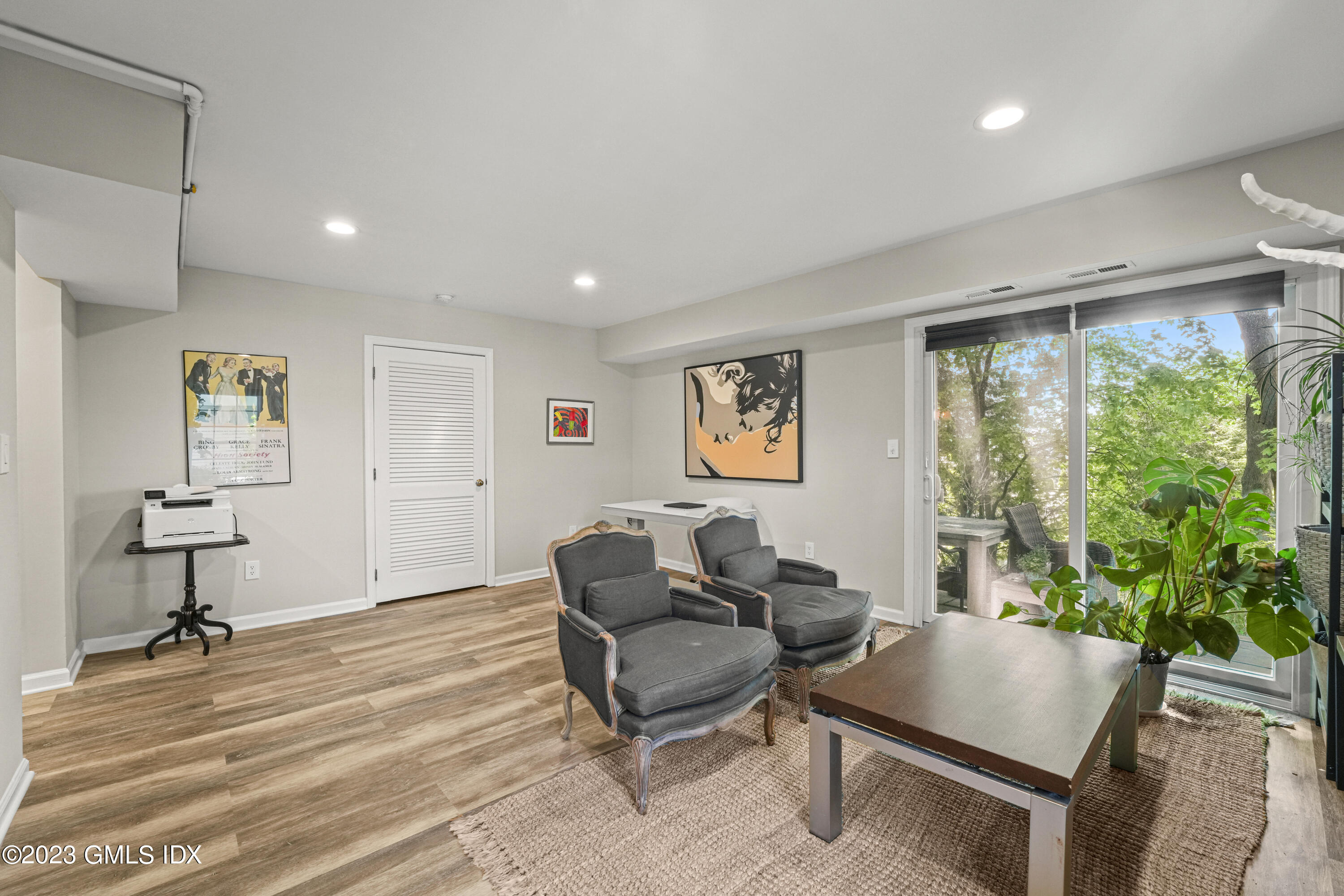 172 Field Point Road, Unit 6 Greenwich, CT 06830 - Photo 26 of 36 a living room with furniture and a window
