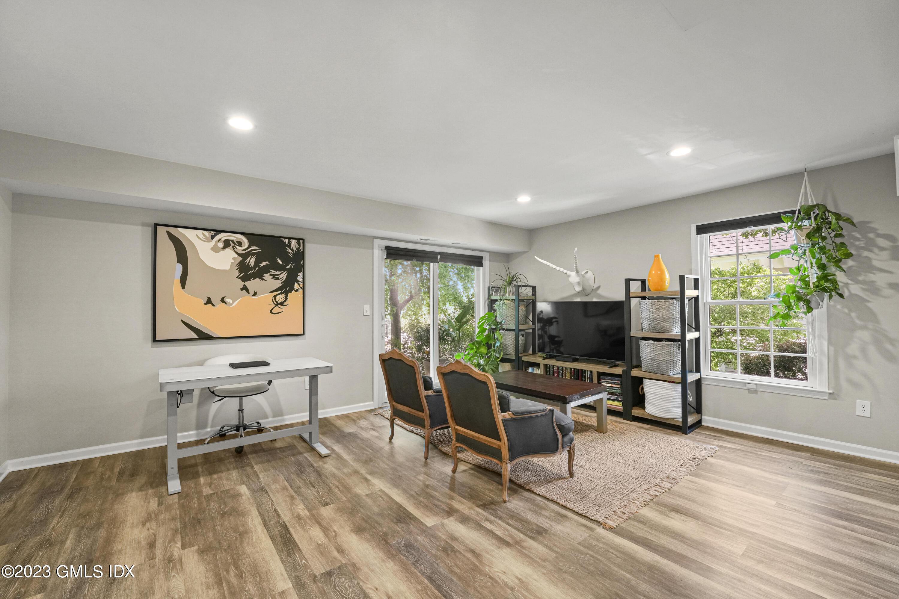 172 Field Point Road, Unit 6 Greenwich, CT 06830 - Photo 28 of 36 a workspace with wooden floor and a window