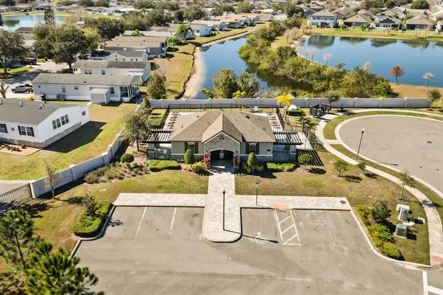 an aerial view of a house with a swimming pool