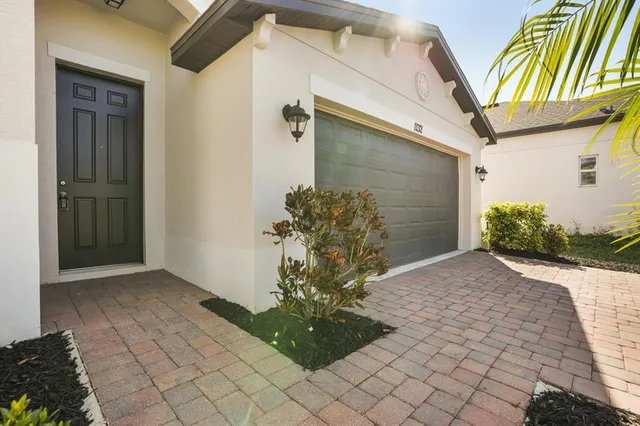 a view of a entryway door front of house