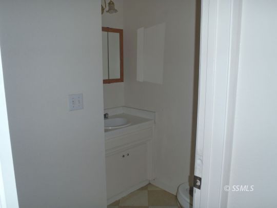 519 East Ridgecrest Boulevard Ridgecrest, CA 93555 - Photo 16 of 16 a bathroom with a shower
