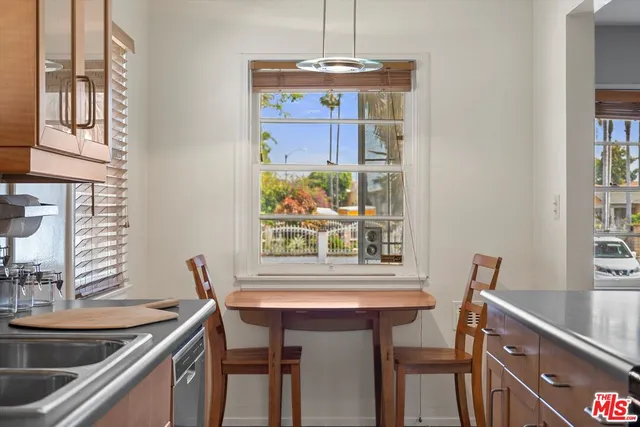 a kitchen with a sink and a window