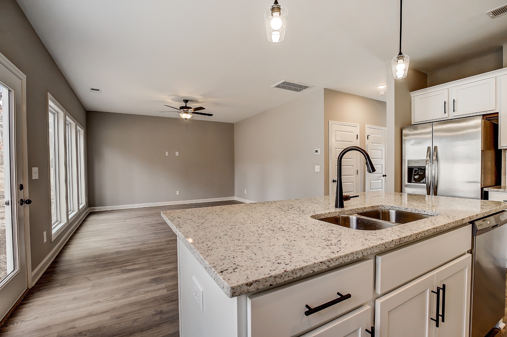 1776 Fenway Loop Antioch, TN 37013 - Photo 14 of 39 a kitchen with sink and refrigerator