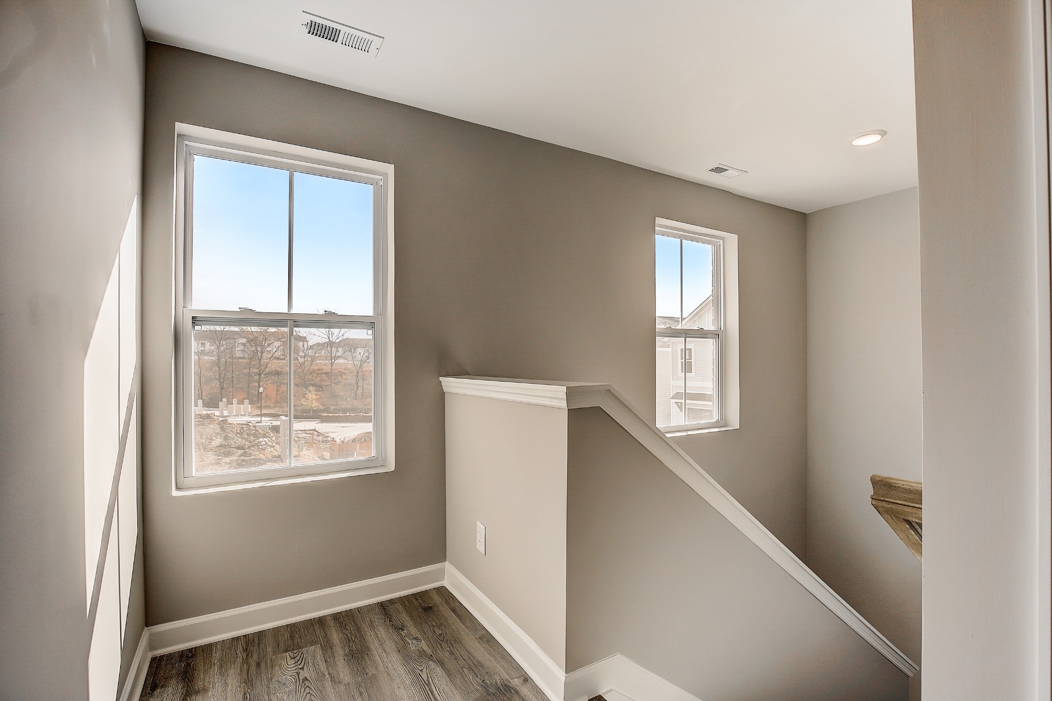 1776 Fenway Loop Antioch, TN 37013 - Photo 20 of 39 a view of hallway with window and wooden floor