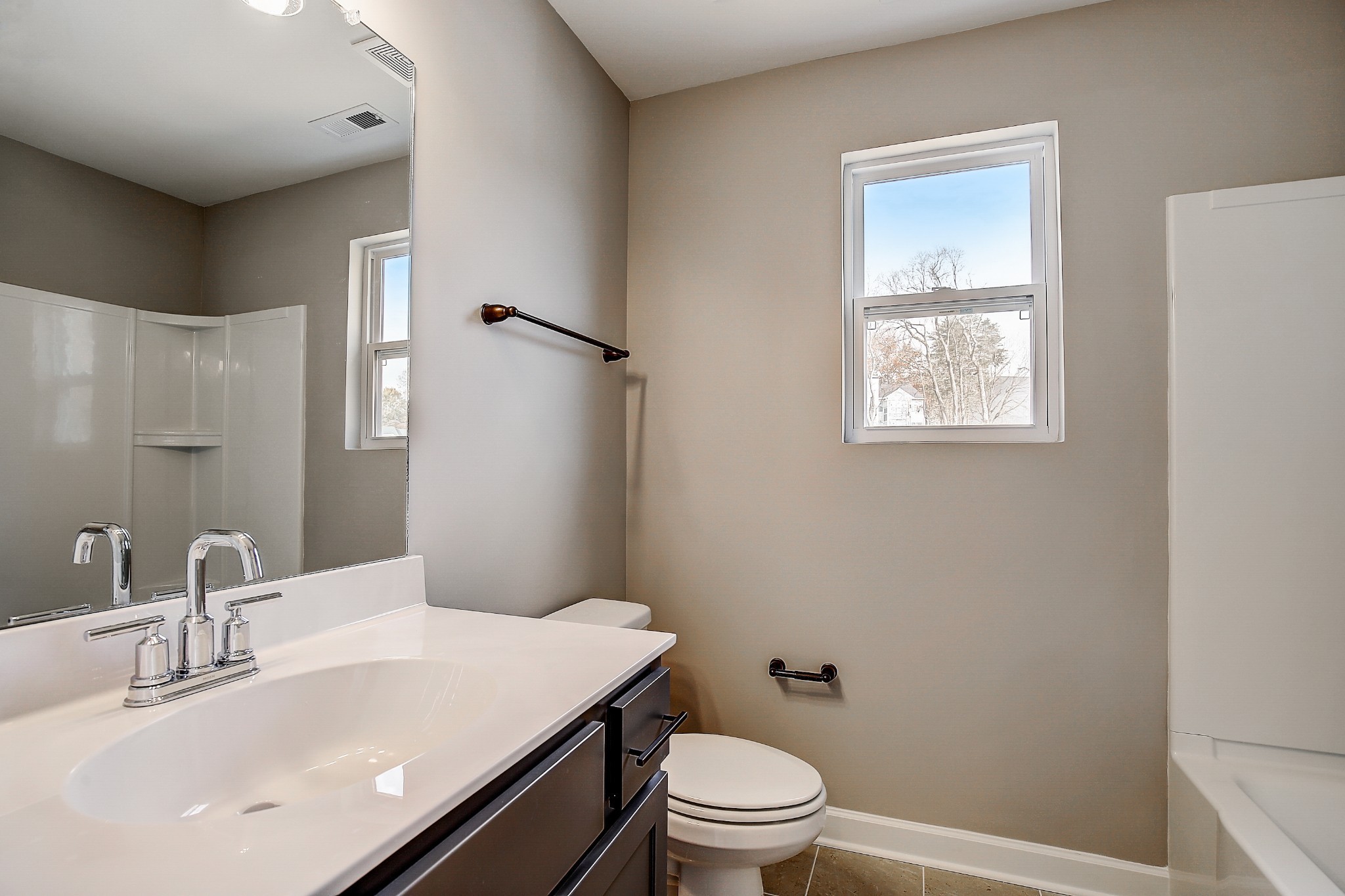 1776 Fenway Loop Antioch, TN 37013 - Photo 22 of 39 a bathroom with a sink a toilet and shower