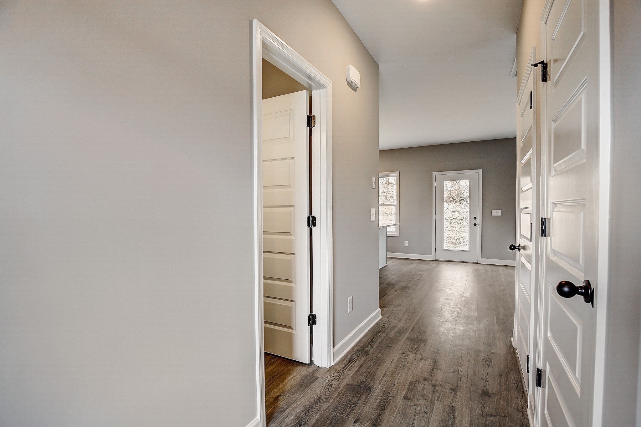1776 Fenway Loop Antioch, TN 37013 - Photo 6 of 39 a view of a hallway with wooden floor