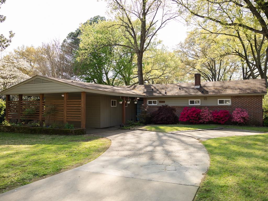 1089 Ivy Road Memphis, TN 38117 - Photo 2 of 32 a view of a house with a yard