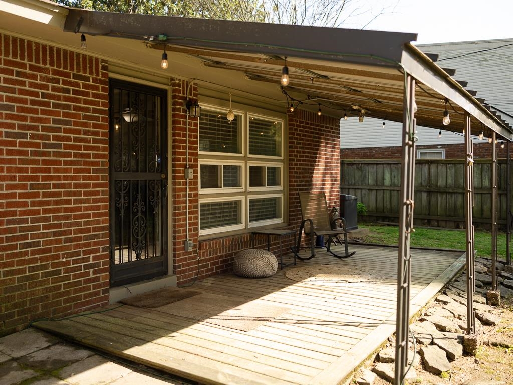 1089 Ivy Road Memphis, TN 38117 - Photo 32 of 32 a backyard of a house with seating space