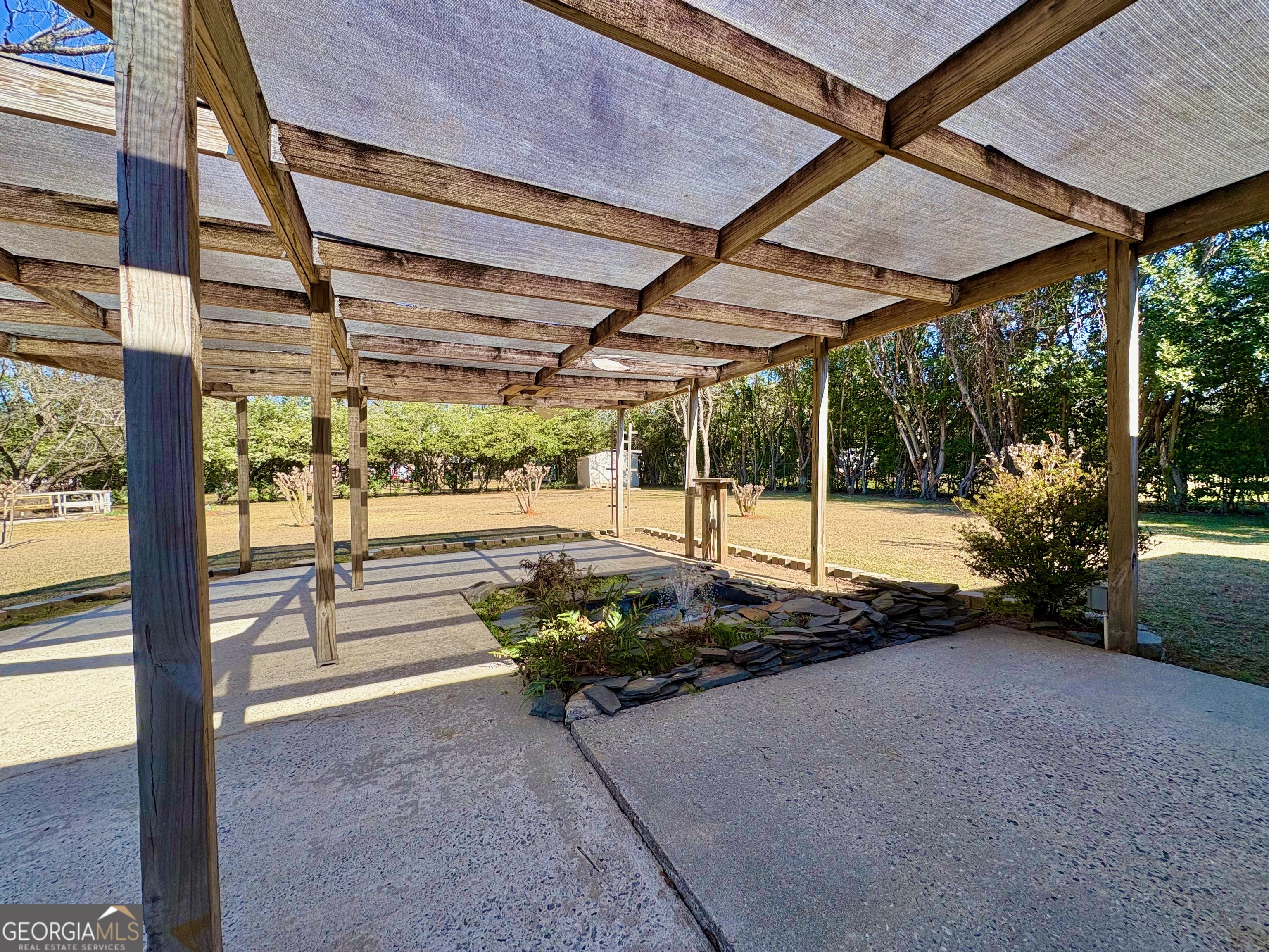 404 Magnolia Street Fort Valley, GA 31030 - Photo 17 of 21 a view of a swimming pool with a patio