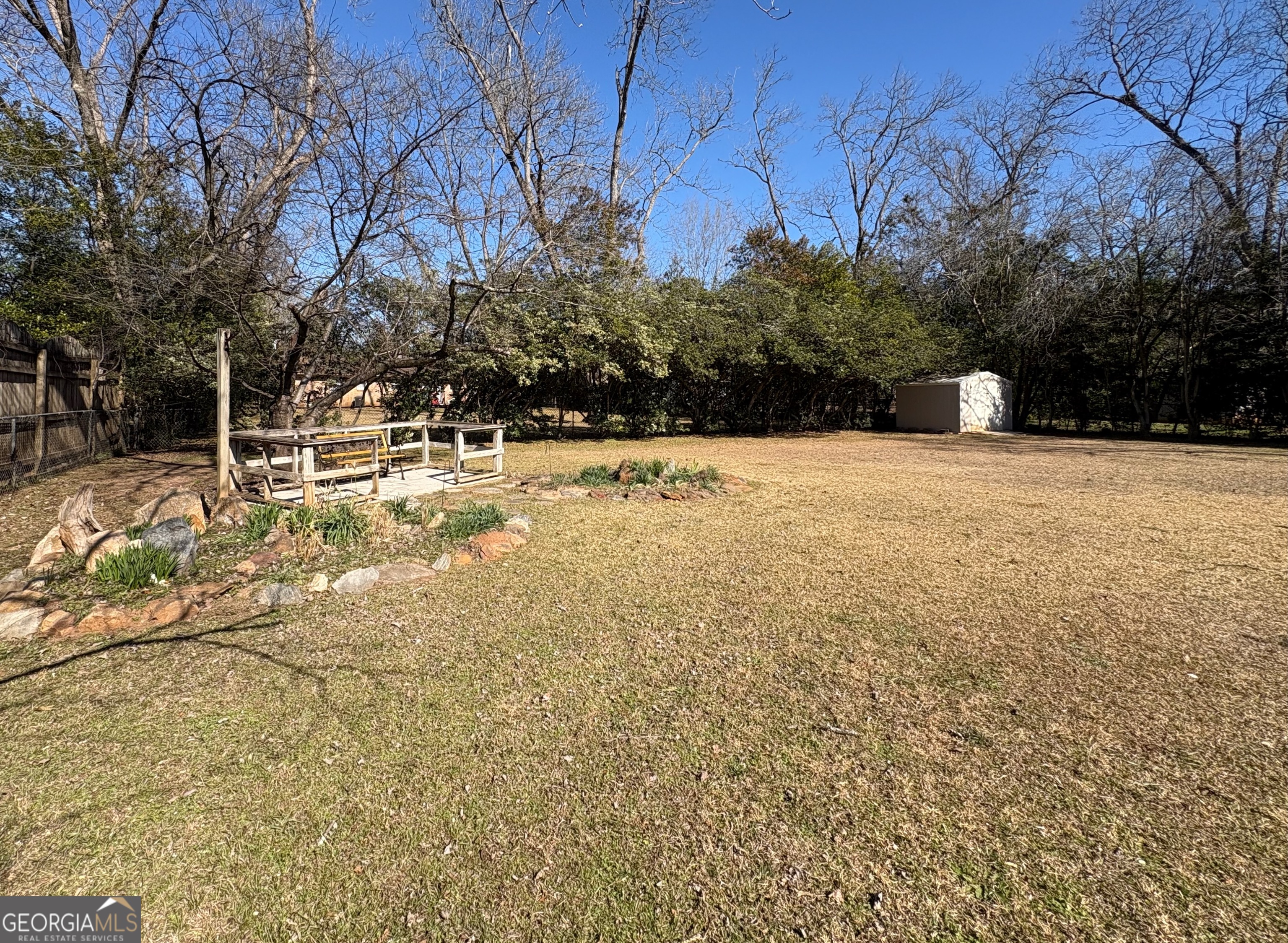 404 Magnolia Street Fort Valley, GA 31030 - Photo 18 of 21 a view of empty space with trees
