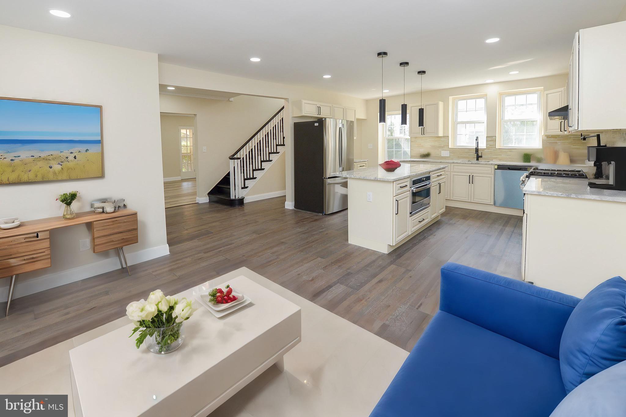 537 Church Road Elkins Park, PA 19027 - Photo 11 of 39 a living room with furniture and kitchen view