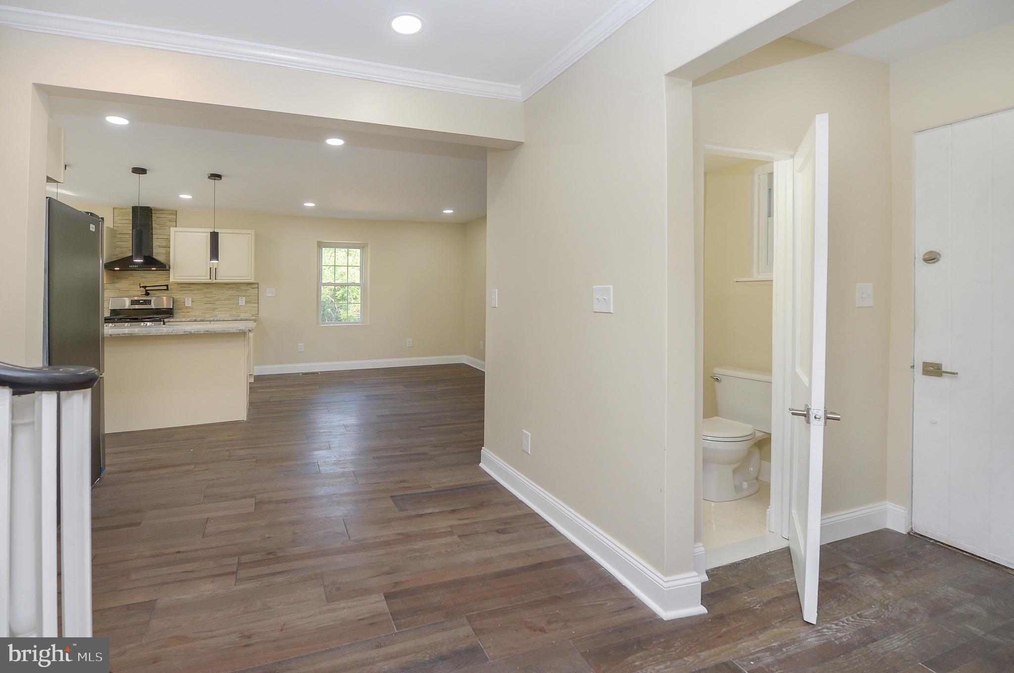 537 Church Road Elkins Park, PA 19027 - Photo 12 of 39 a view of kitchen with sink and wooden floor