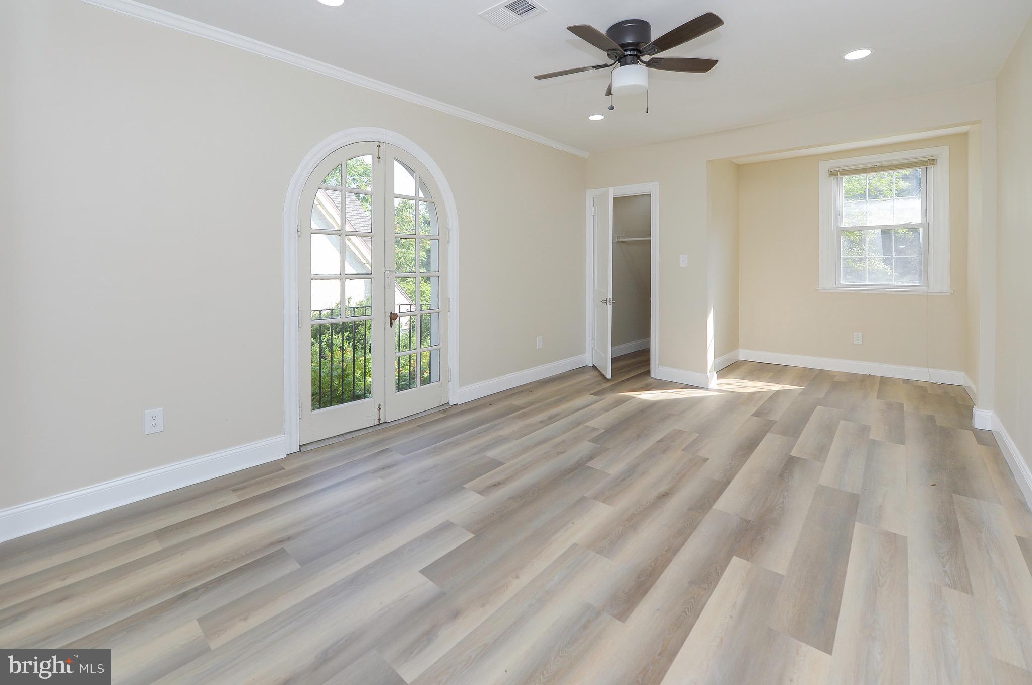 537 Church Road Elkins Park, PA 19027 - Photo 22 of 39 wooden floor in an empty room with a window