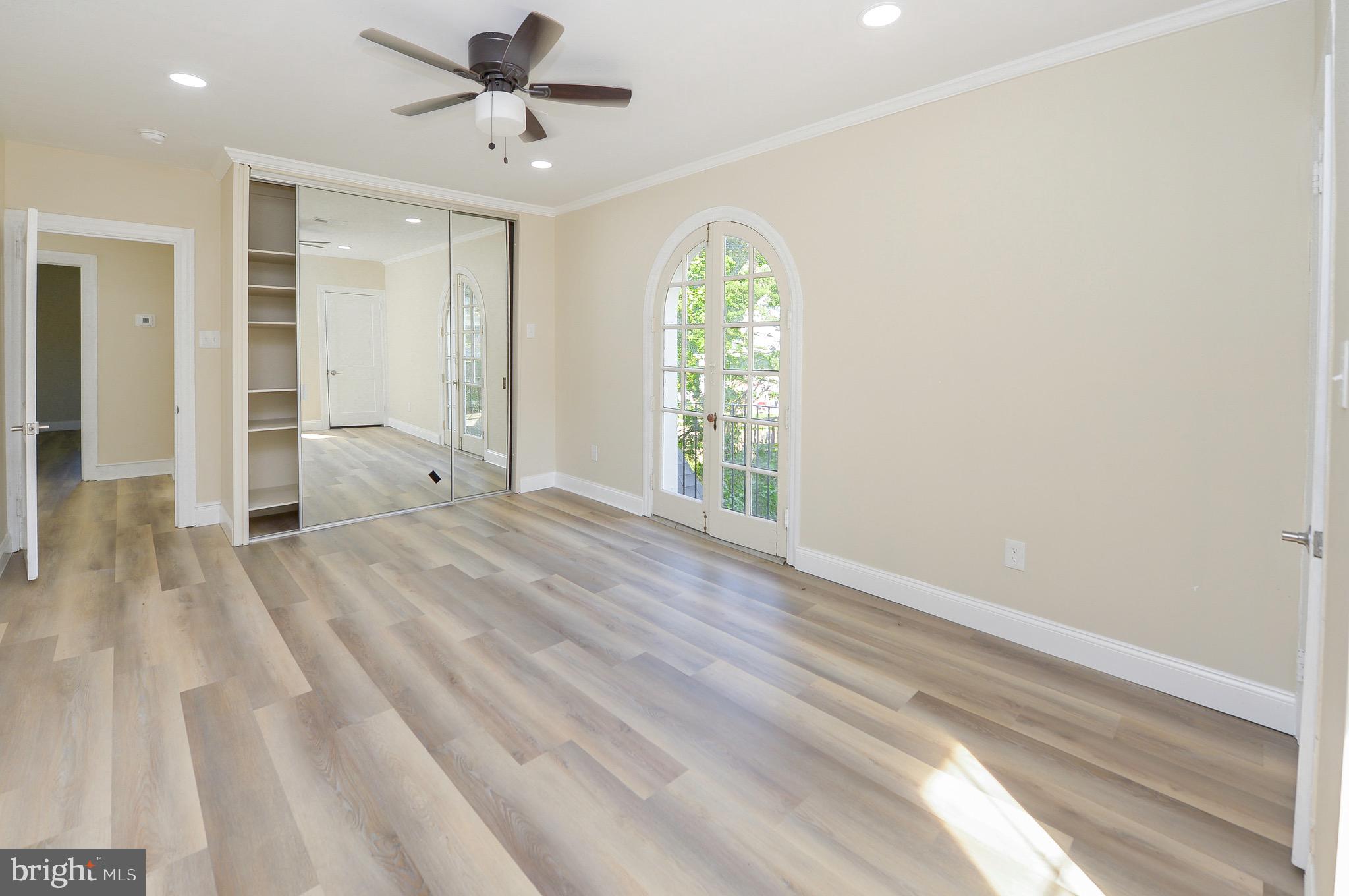 537 Church Road Elkins Park, PA 19027 - Photo 23 of 39 wooden floor in an empty room with a window