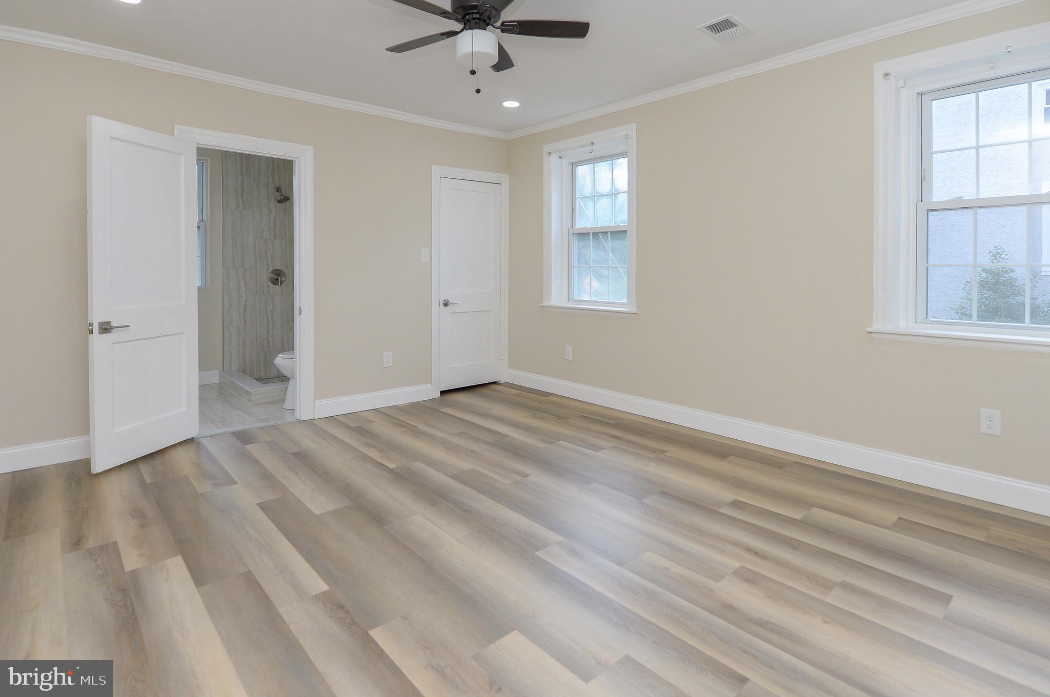 537 Church Road Elkins Park, PA 19027 - Photo 24 of 39 an empty room with windows and closet