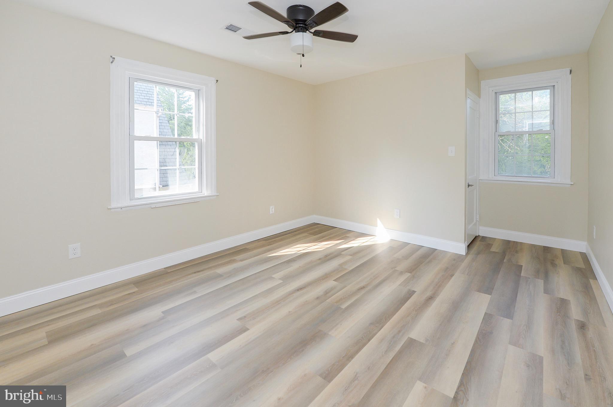 537 Church Road Elkins Park, PA 19027 - Photo 29 of 39 wooden floor in an empty room with a window