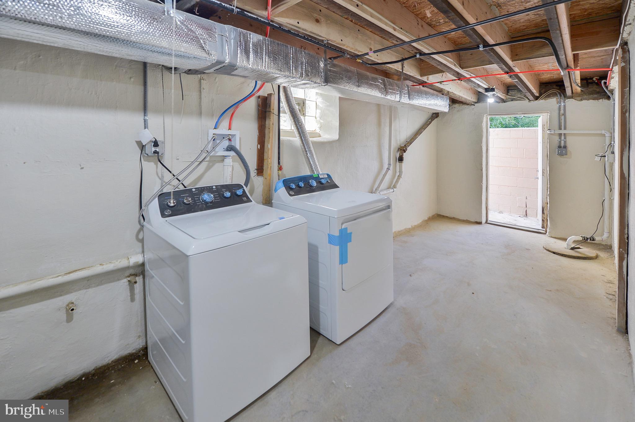 537 Church Road Elkins Park, PA 19027 - Photo 37 of 39 a utility room with dryer and washer