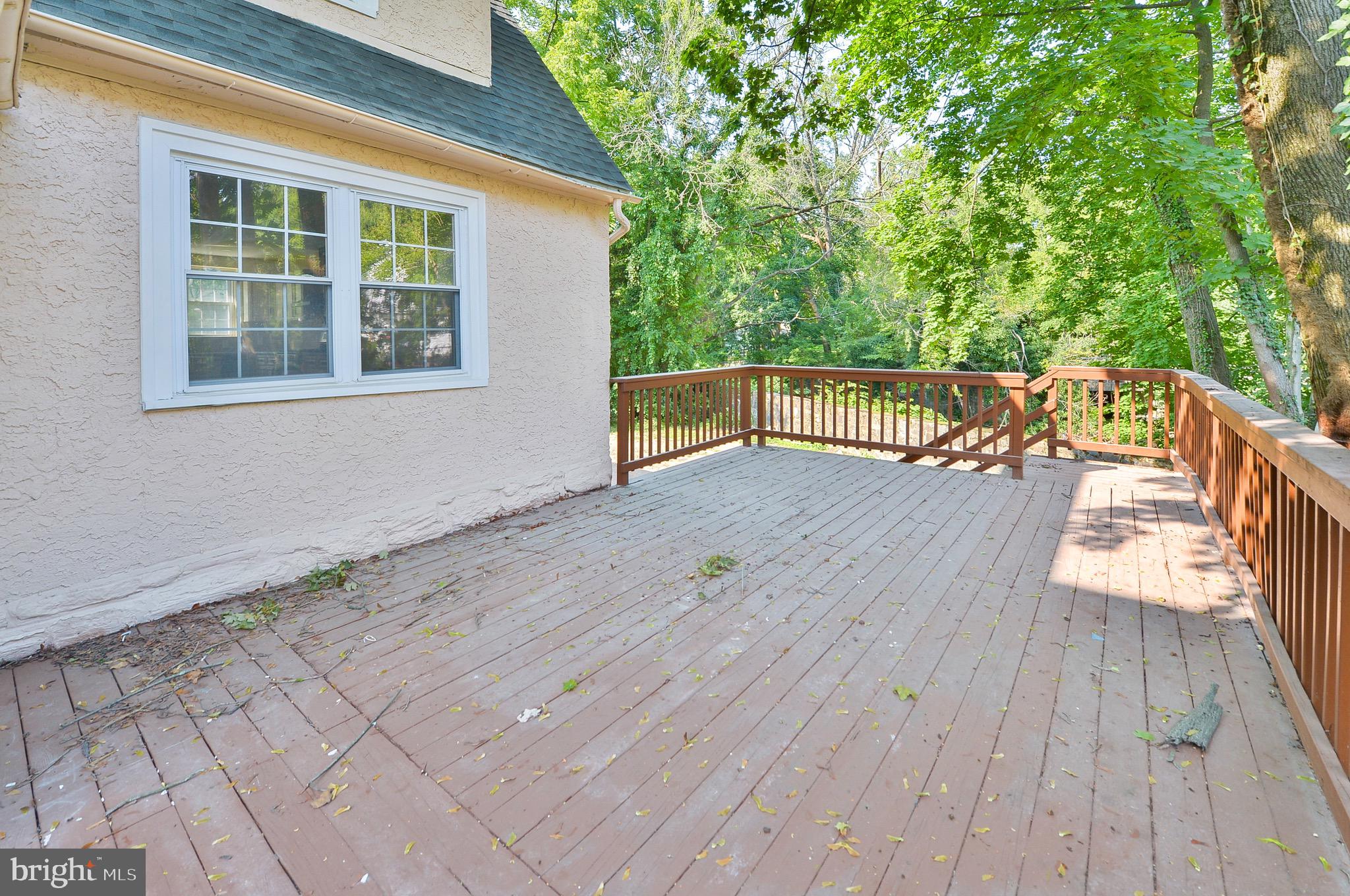 537 Church Road Elkins Park, PA 19027 - Photo 4 of 39 a view of balcony with wooden floor and fence