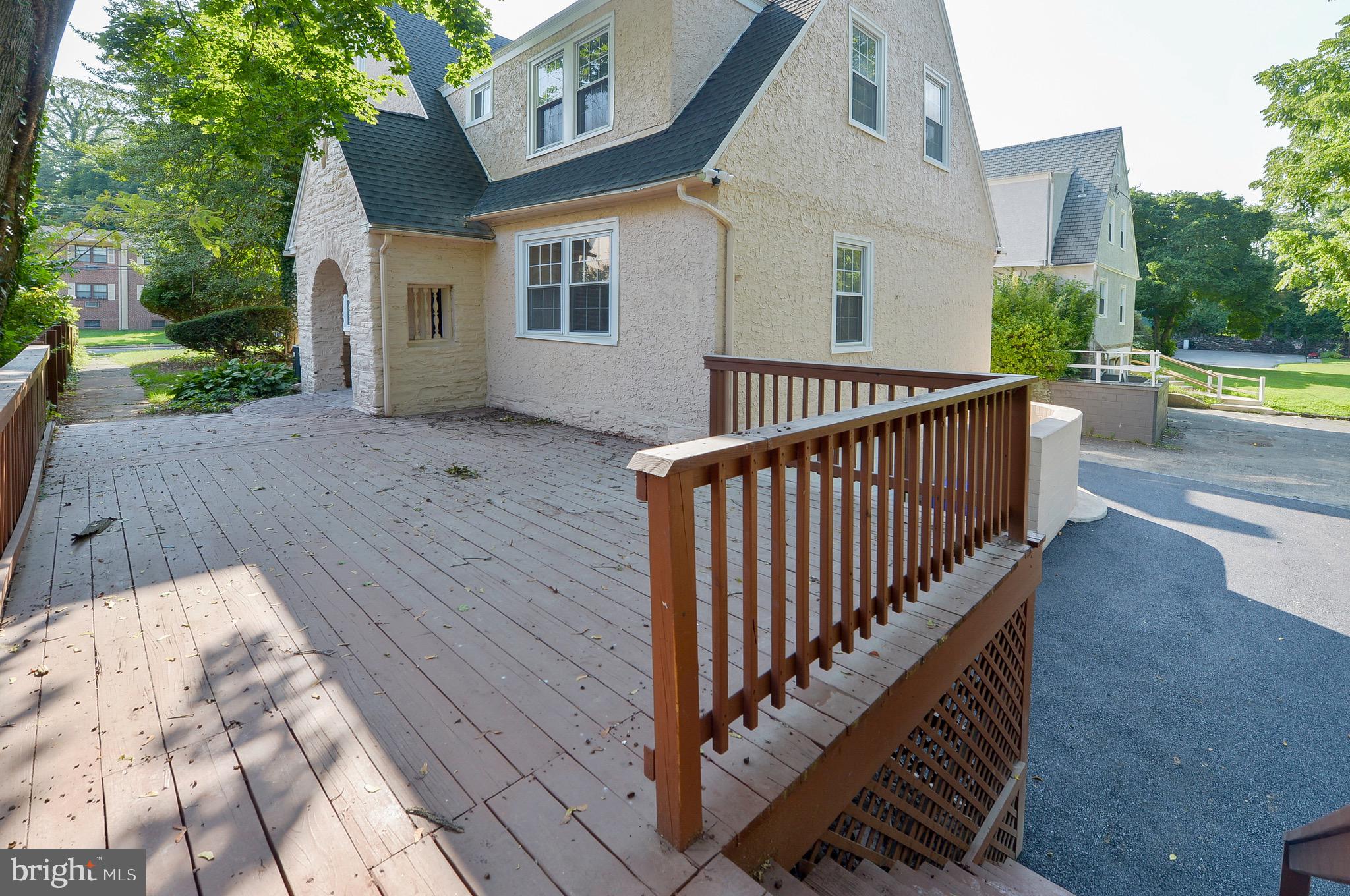 537 Church Road Elkins Park, PA 19027 - Photo 5 of 39 a view of a wooden deck and a yard