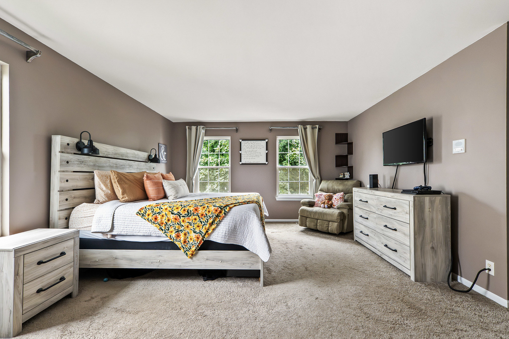 712 Wilson Street Waterman, IL 60556 - Photo 12 of 24 a bedroom with furniture and windows