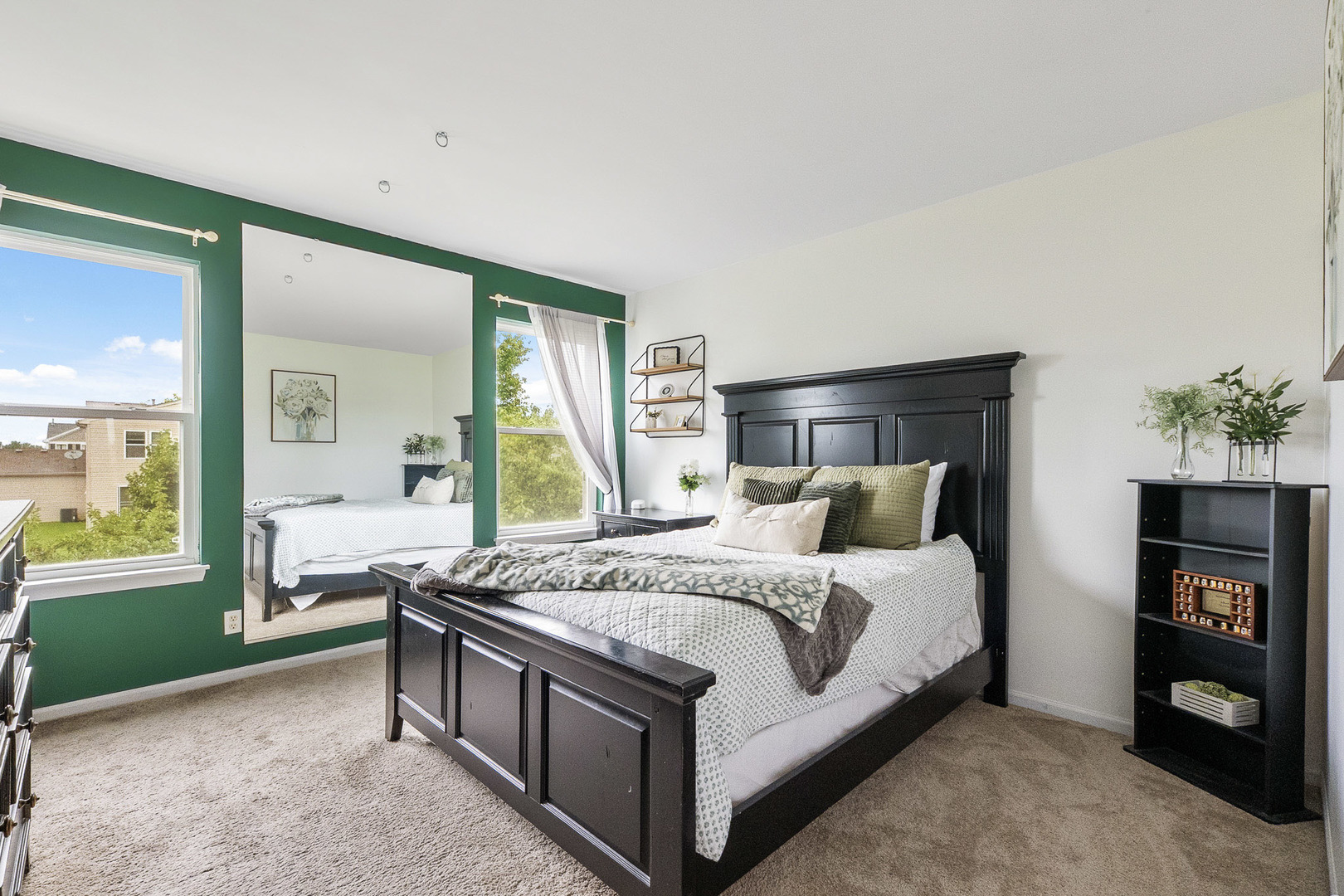 712 Wilson Street Waterman, IL 60556 - Photo 15 of 24 a large bedroom with a bed and a large window